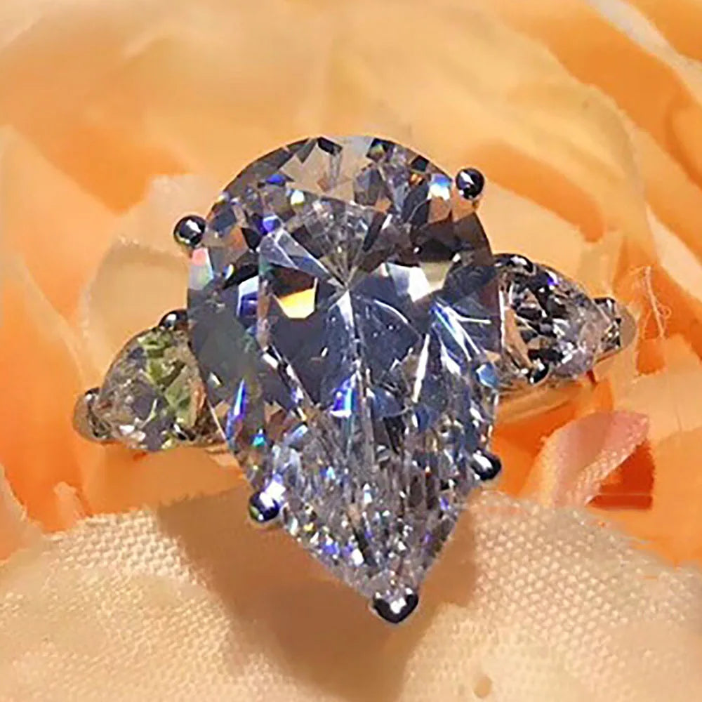Say yes to sparkle like never before!!! 💍✨ 18K Au750 White Gold Women Wedding Party Engagement Ring 1 2 3 4 5 Carat Water Drop Pear Moissanite Diamond Ring Elegant Trendy - $676.99 is everything you dreamed of — pear-shaped fire, clean lines, and major wow-factor!!! 😍🔥 Pick this for the moment everyone remembers!!! 🥂🎉

Ready to shop? The link is in our bio.

#Engagement #WeddingRing #DiamondRing #Moissanite #FineJewelry #JewelryLovers #RingLover