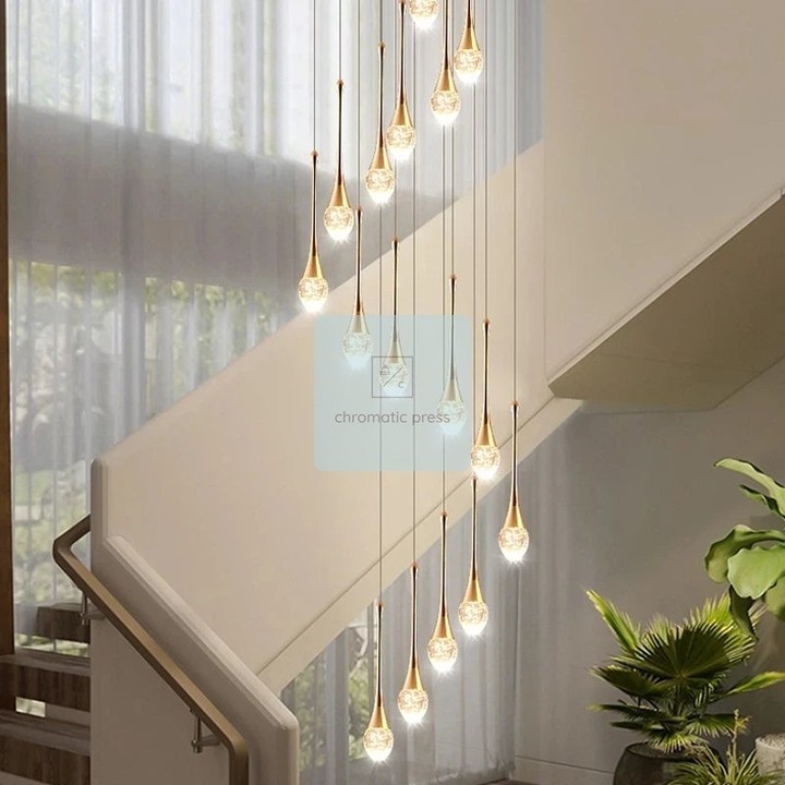 Light cascading down a multi-story stairwell, casting prismatic reflections across marble and gold finishes.

That's the moment a Modern Crystal LED Chandelier transforms your space. This luxury fixture brings sophistication to any grand entrance, lobby, or living room—turning ordinary hallways into stunning architectural statements.

With dimmable LED technology, you control the ambiance. The polished stainless steel and crystal design catches light beautifully from every angle. Remote control makes adjustments effortless.

Available now for $815.99. Elevate your home today.

https://chromatic-press.myshopify.com/products/modern-crystal-led-chandeliers-for-living-room-lobby-luxury-cristal-long-staircase-hanging-lights-creative-gold-indoor-luminaire1705586218446

#LuxuryChandelier #CrystalLighting #ModernDesign #StaircaseDecor #InteriorLighting