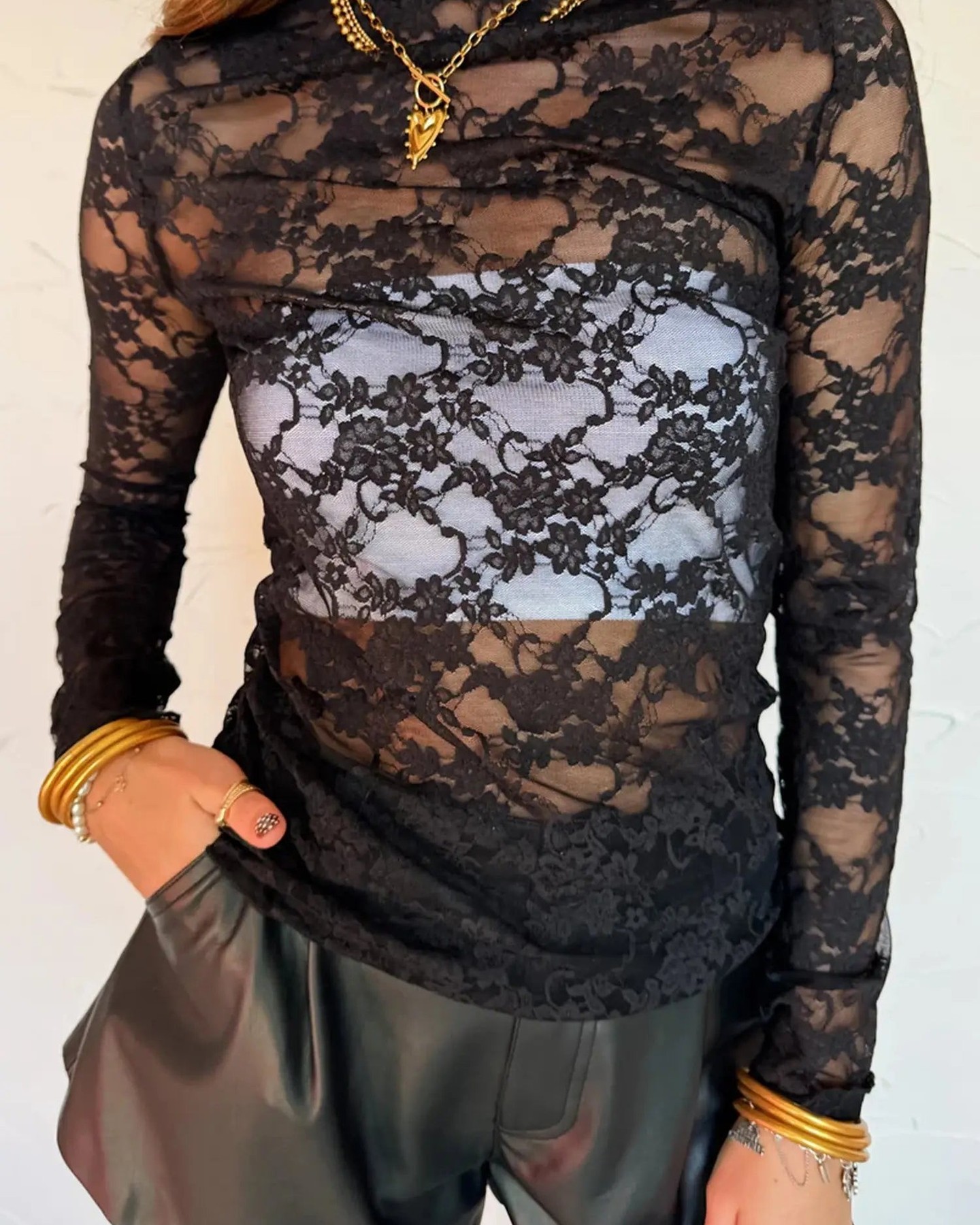 You slip on something sheer and suddenly the whole evening shifts into focus.

This black lace top does that thing—it looks effortlessly elegant while feeling completely you. The delicate floral lace drapes beautifully, while the mock neck and lettuce trim edges add that polished touch that takes you from casual to genuinely put-together.

Perfect for nights out, smart-casual moments, or whenever you want to feel a little more romantic and a lot more confident.

Now at £13.07. Grab yours at 

#LaceTopsUK #MockNeckTop #SheelLaceTop #LettuceTrimTop #ElegantStyle