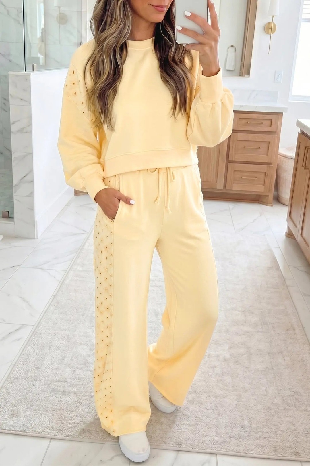 Your loungewear just got a major upgrade. 

This eyelet embroidered lace set combines delicate craftsmanship with serious comfort—the cropped pullover and drawstring pants work perfectly together for effortless style.

Butter yellow is *the* colour moment of 2025, and this two-piece delivers it with artisanal details that feel anything but basic. The eyelet embroidery adds texture and visual interest you won't find in standard co-ords.

Perfect for relaxed days at home or easy outings. Now at £46.77.

#EyeletEmbroideredSet #ButterYellowFashion #CroppedPulloverSet #LoungewearSets #MatchingSetUK