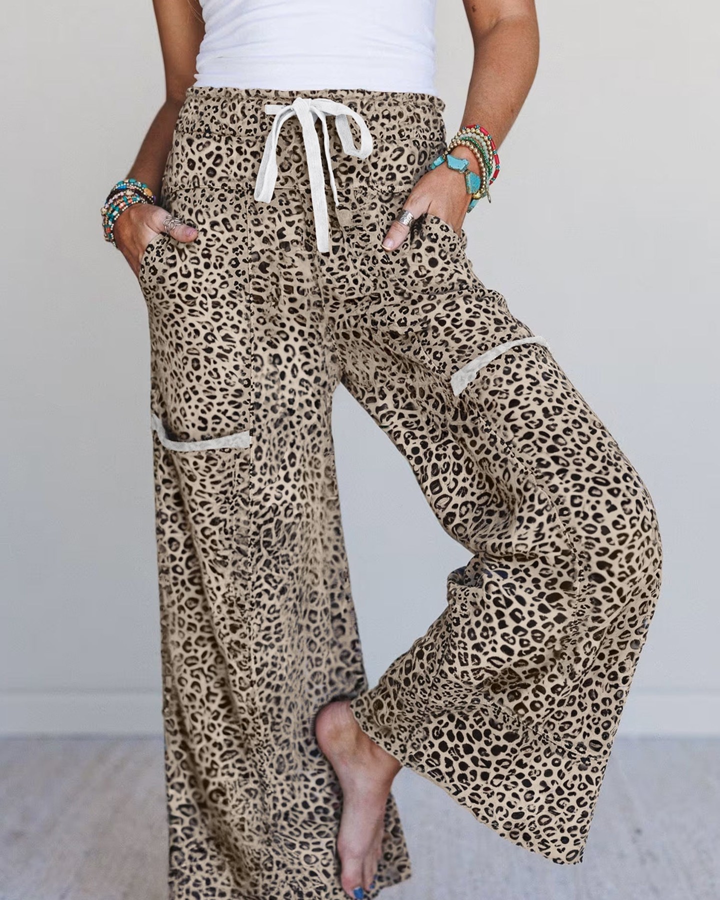 Comfort and style don't have to compete—these terry knit wide-leg pants prove it.

Soft leopard print, adjustable high waist, and a relaxed silhouette that works from home to out-and-about. The textured terry knit fabric feels as good as it looks.

#AnimalPrintFashion #WideLegPants #LoungewearStyle #TerryKnitEssentials #CasualComfort