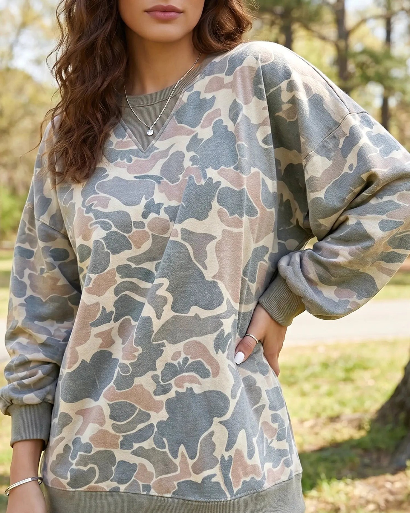 Your everyday look just got an upgrade. This camo print pullover combines bold style with all-day comfort—the stretch fabric moves with you, while ribbed trim details keep it polished and put-together.

#CamoStyle #WomensFashion #CasualEssentials #SweatshirtSeason #ConfidentStyle