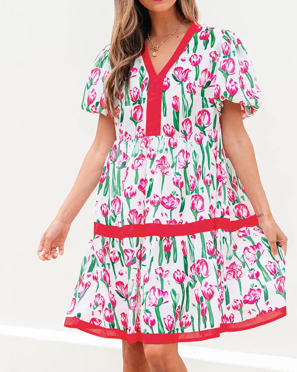 The babydoll silhouette with its empire waist and flared skirt creates a playfully feminine shape that flatters beautifully.

This pink floral dress is pure romance. The bubble sleeves add that perfect romantic volume, the V neck frames your décolletage elegantly, and the contrast trim gives everything a polished edge.

Perfect for summer days when you want to feel effortlessly feminine and confident.

Now at £32.80.

Shop here: 

#BabydollDress #PinkFloral #SummerStyle #FeminineVibes #ShopNow