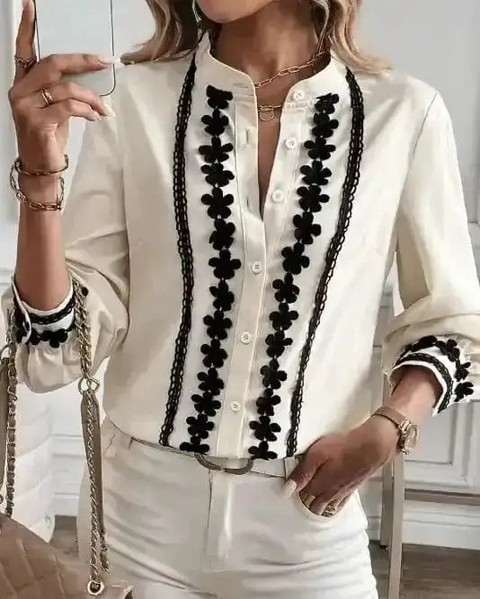 Ever wondered how a simple shirt can become a conversation piece?

This Off White Embroidered Stand Neck Button Shirt elevates your everyday wardrobe with intricate artisan embroidery on premium cotton. The distinctive stand neckline and thoughtful details make it perfect for smart casual moments or special occasions.

#EmbroideredShirt #SmartCasualStyle #ArtisanCraft #ElegantBlouse #SpringFashion