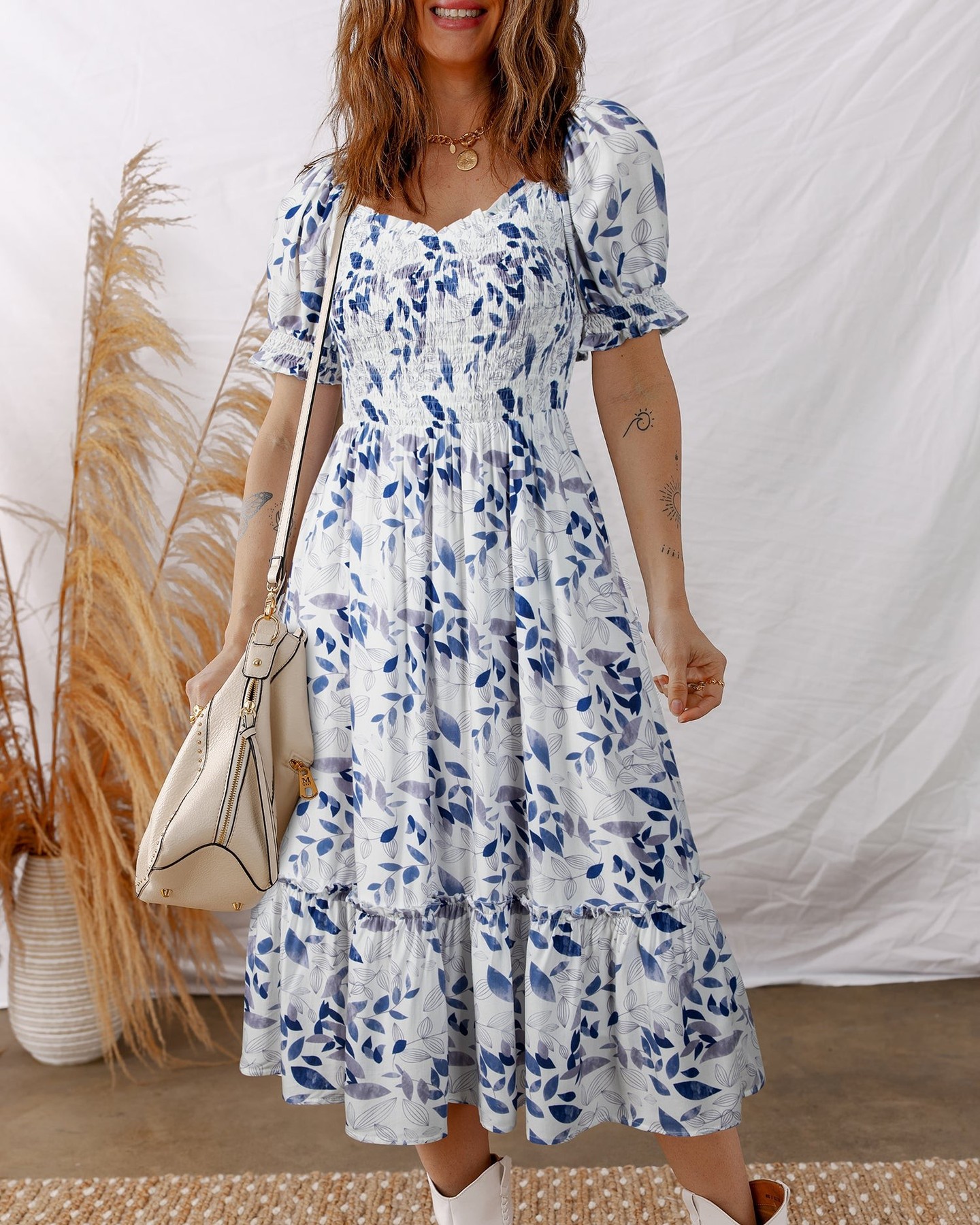 Morning coffee in hand, you slip into a dress that actually fits your curves just right.

The smocked bodice hugs gently while those tiered layers give you effortless movement and flattering shape. Sky blue florals paired with delicate puff sleeves? Pure summer magic that works for brunch, garden parties, or a casual day out.

Now at £38.15 for this season's must-have midi.

Shop here: 

#SkyBlueDress #MidiDressStyle #SummerFashion #FloralDress #VacationOutfit