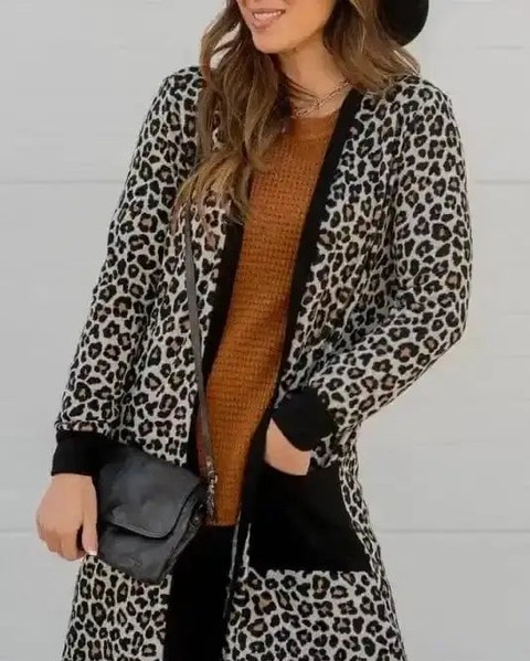 Throwing on a cardigan that instantly elevates every outfit without trying.

This leopard duster cardigan is your new layering essential. Bold print, dramatic length, effortless sophistication. The open front makes it perfect for pairing over anything, and the fluid polyester blend drapes beautifully all day long.

#LeopardCardigan #DusterCardigan #WomensFashion #LayeringEssentials #StatementStyle