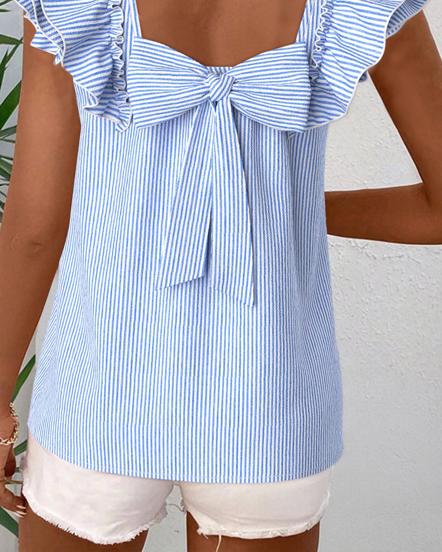 Ever noticed how one tiny detail can completely transform an outfit?

This Sky Blue Striped Square Neck Ruffled Bow Blouse does exactly that. The classic blue and white stripes give you that effortless, fresh look — but the real magic? A gorgeous bow back detail that catches every angle, paired with a flattering square neckline and playful ruffle sleeves.

It's the kind of piece that makes casual dressing feel intentional. Perfect for weekends, work, or whenever you want to feel genuinely put-together.

Now at £21.05.

#SquareNeckBlouse #RuffledBlouse #SummerBlouseUK #BowBackBlouse #CasualStyle