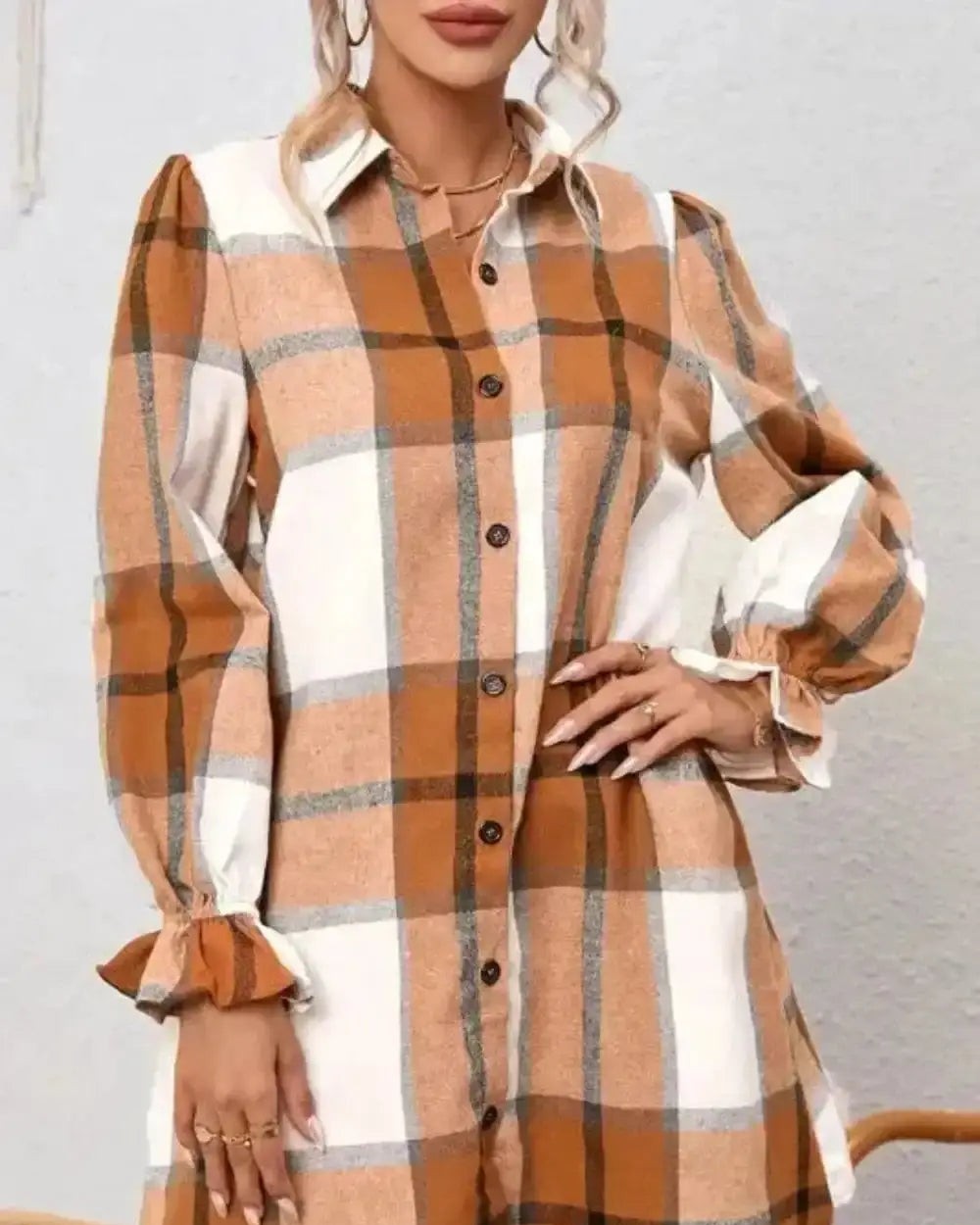 65% polyester, 35% cotton blend—the perfect fabric weight for effortless draping without clinging.

This khaki plaid midi dress features ruffled flounce sleeves and a structured pointed collar that transforms a classic print into something genuinely pretty. The H-line silhouette hits mid-calf for a flattering, easy look that works from desk to dinner.

#KhakiPlaidDress #MidiShirtDress #RuffledSleeveDress #FallFashionUK #WomensDressesUK