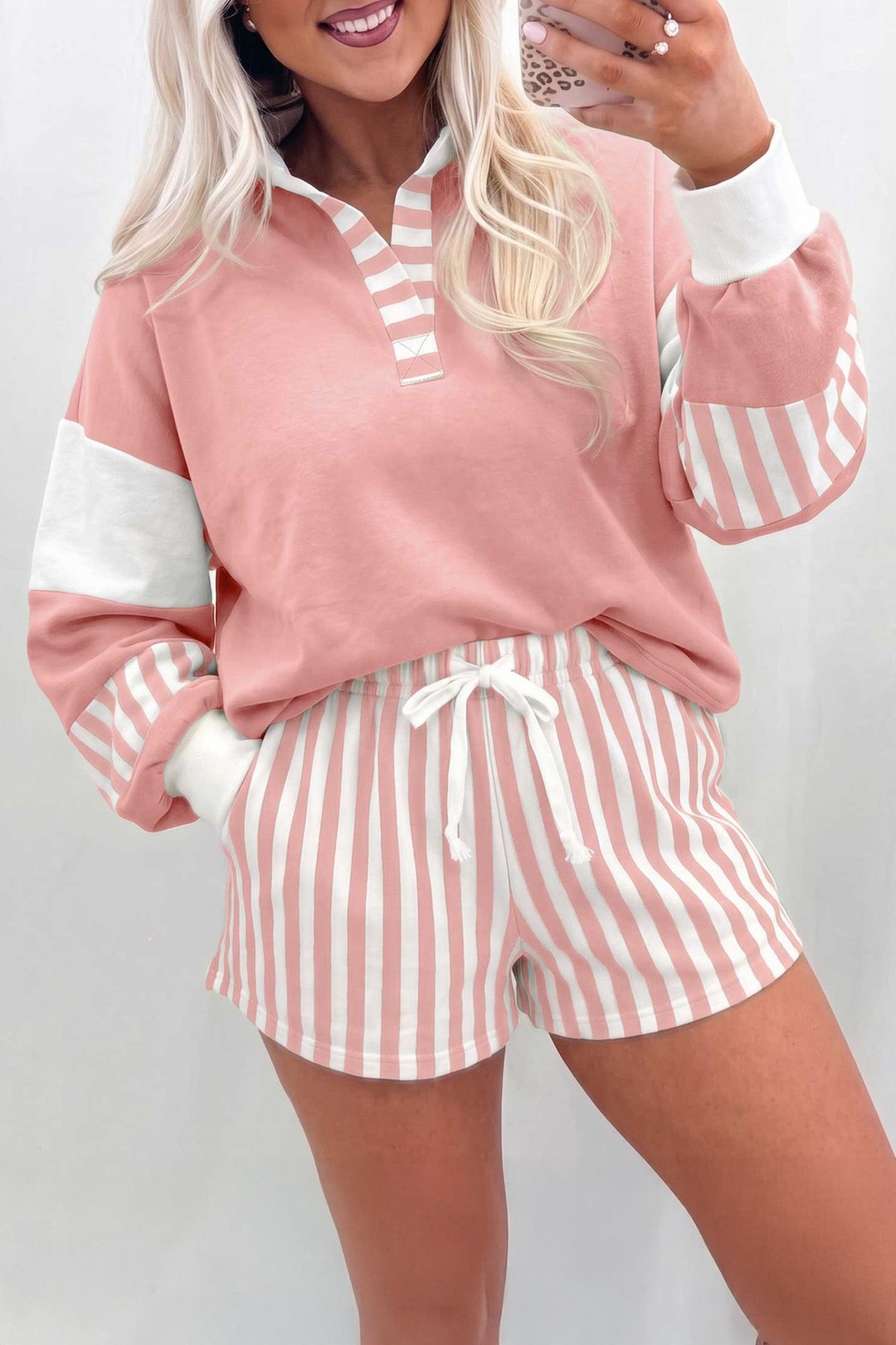Morning coffee in your favorite outfit—that effortless moment when comfort meets style.

This gossamer pink striped set is your new go-to for days when you want to feel put-together without trying too hard. The color-block design adds visual interest, while the soft pullover top and drawstring shorts keep you moving freely. Perfect for casual days, weekend hangouts, or whenever you need that cozy-chic vibe.

Now at £32.81 with our current discount.

Shop the set: 

#CasualStyle #PinkAesthetic #ComfyFashion #FallOutfit #EffortlessStyle