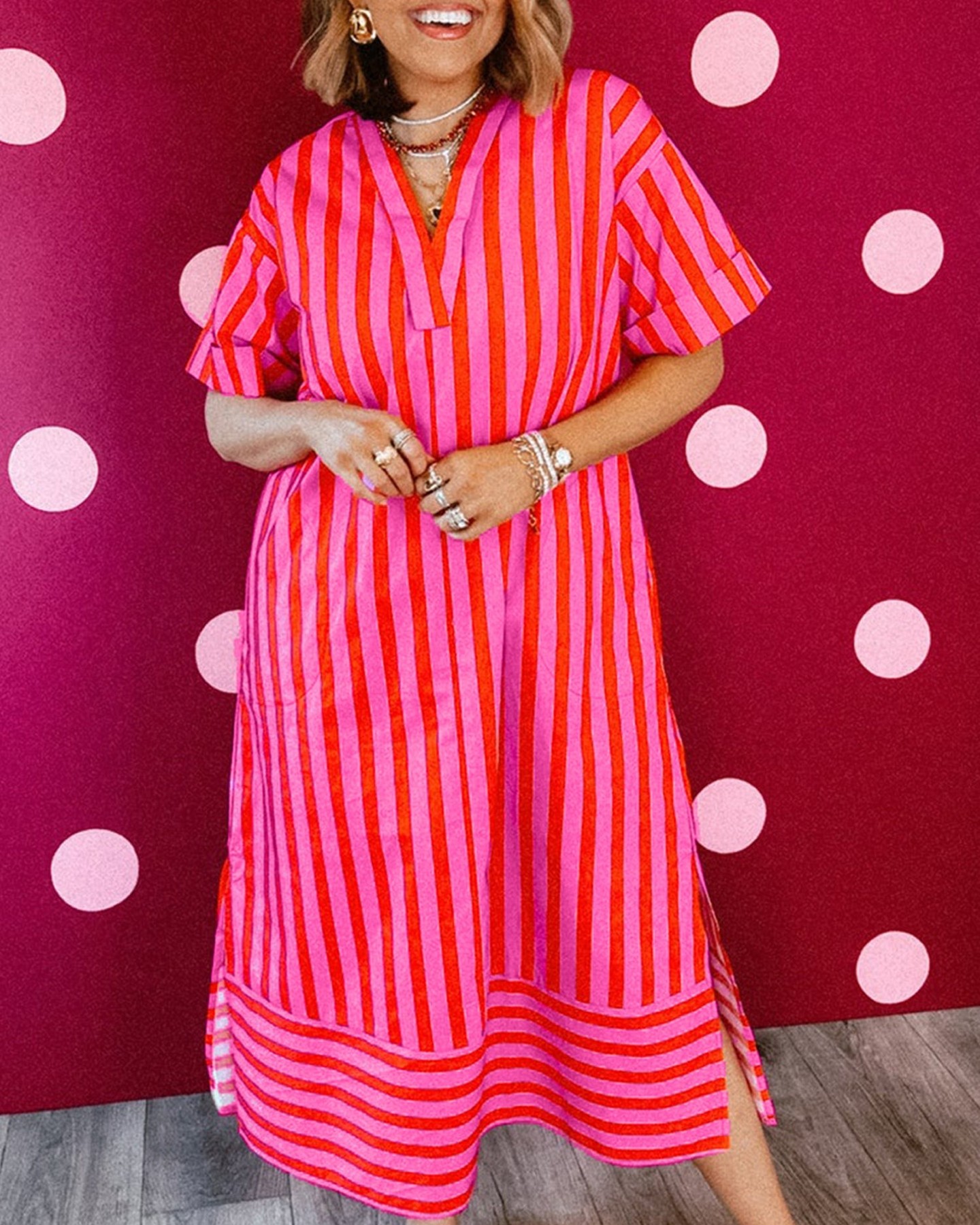 Your summer wardrobe just got easier.

This relaxed midi dress brings effortless style with red and white vertical stripes that elongate and flatter. The V-neckline and cuffed sleeves add a polished touch, while the side split gives you freedom to move. Plus, front pockets mean you can actually carry your essentials.

Perfect for casual days, holidays, or whenever you want to look put-together without trying too hard.

Now at £31.04 — grab yours before it's gone.

#StripeMidiDress #SummerStyle #CasualFashion #MidiDressUK #EffortlessStyle