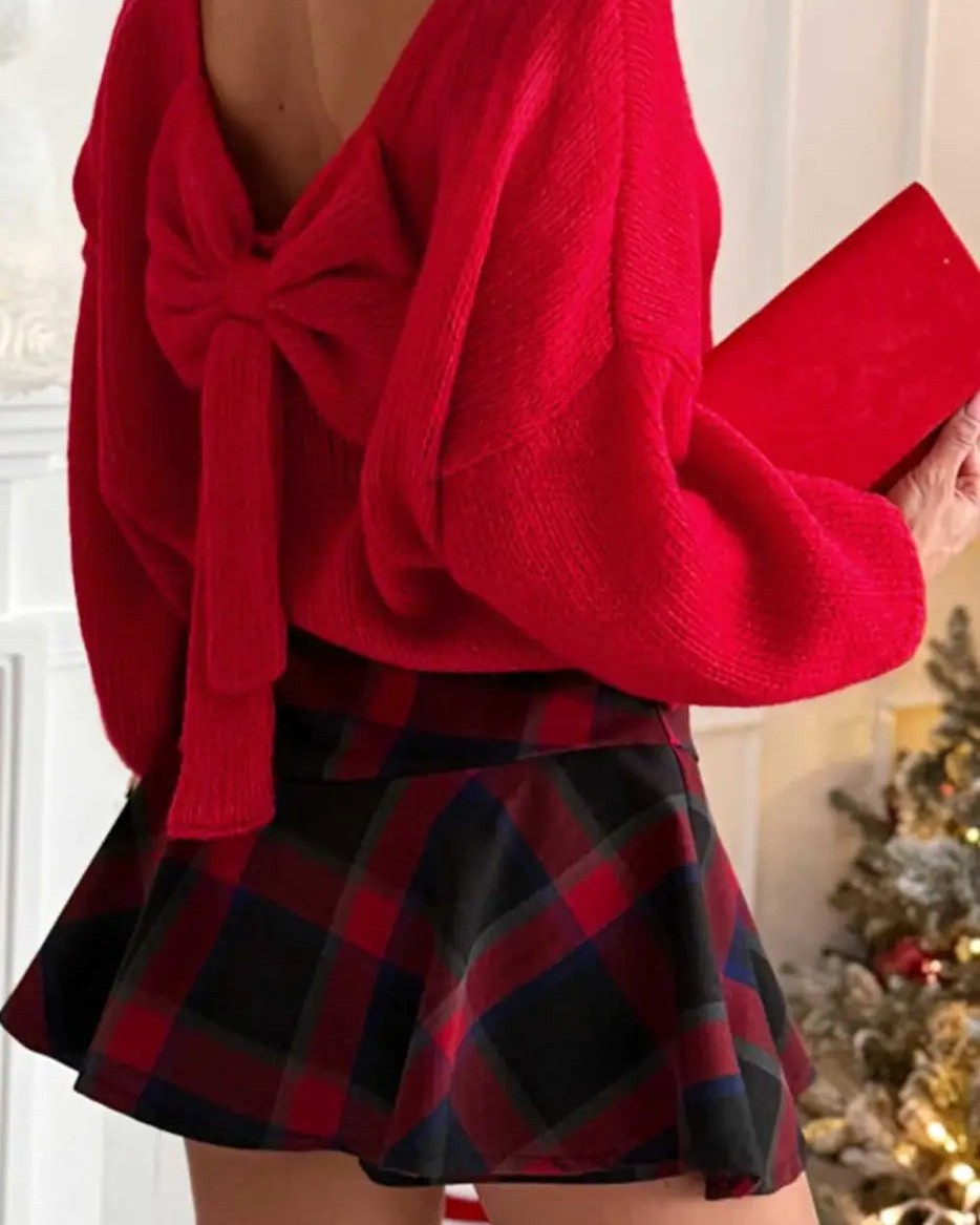 The backless jumper occupies a very specific and very interesting space in UK fashion — it is knitwear that refuses to be cosy. The construction is familiar: ribbed knit, a neckline, long sleeves. But the back changes everything. An open back on a jumper — whether a dramatic ...