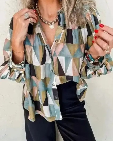 You walk into a room and heads turn—that's the power of a top that actually says something.

The Geometric Print Balloon Sleeve Top drapes like silk against your skin, thanks to its luxurious viscose blend. Bold geometric prints in warm green tones, voluminous balloon sleeves, and ruffled shirred details create that effortlessly chic look you've been craving.

Perfect for everything from coffee dates to nights out. Available now for £28.99 at 

#GeometricPrintTop #BalloonSleeveBlouse #LoosenFitTop #SpringStyle #CasualChic