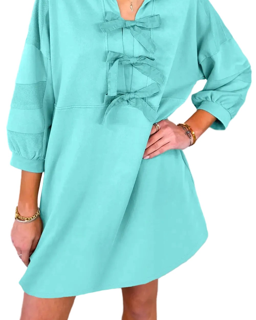 Side pockets on a dress? Yes, please. The Moonlight Jade Bow Collar Bracelet Sleeve Pocketed Mini Dress is here to change the game—finally, a mini dress that's equal parts elegant and practical.

That graceful bow collar? It does the styling work for you. Bracelet sleeves keep things refined, while hidden side pockets mean you can actually carry your essentials. Whether it's brunch, a night out, or smart casual moments, this moonlight jade beauty works effortlessly.

Look polished without the effort. Now at £30.35.

#MiniDressUK #BowCollarDress #PocketedDress #SmartCasualStyle #ElegantDresses