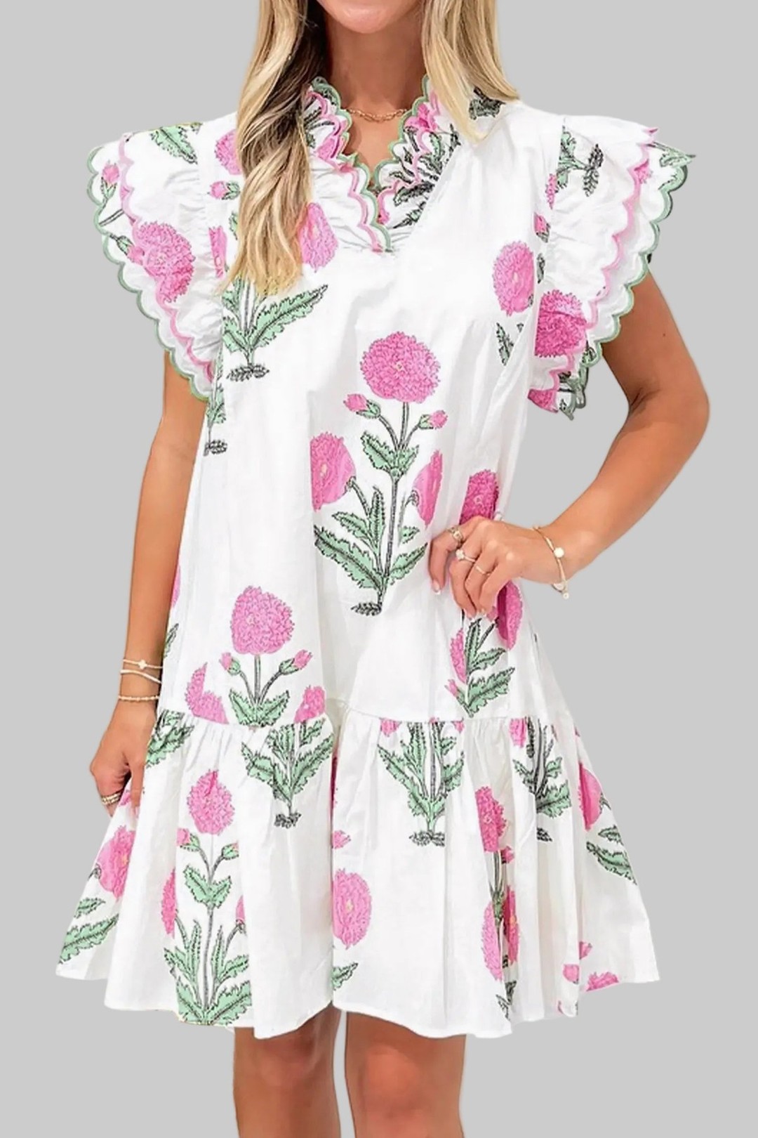 50% viscose, 50% cotton means pure comfort that actually breathes.

This white floral mini dress combines delicate scalloped embroidery with a flattering V-neckline and playful ruffle hem—the perfect balance of romantic and effortless.

Soft, feminine, and ready for any occasion. Now at £62.02.

#FloralMiniDress #WhiteDress #BohoStyle #SummerDress #FeminineStyle