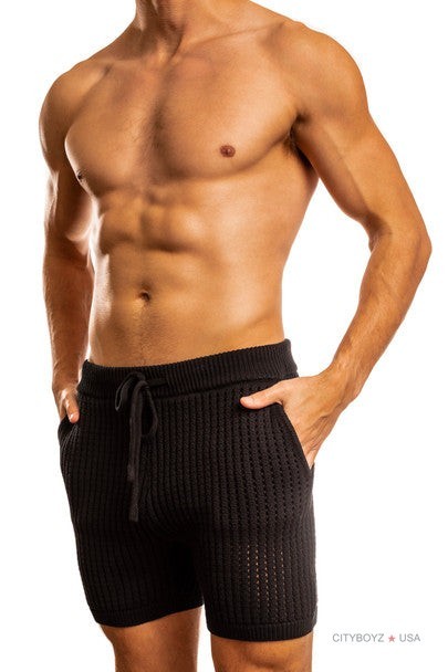 Your summer style just got an upgrade.

The Roddy Crochet Knit Short combines breathable cotton with that perfect Bermuda length—giving you effortless movement and a polished look that works everywhere. The open-knit texture keeps you cool while the ribbed waistband stays put. Plus, pockets.

#JackAdams #SummerStyle #CrochetKnit #MensShorts #WarmWeatherFashion