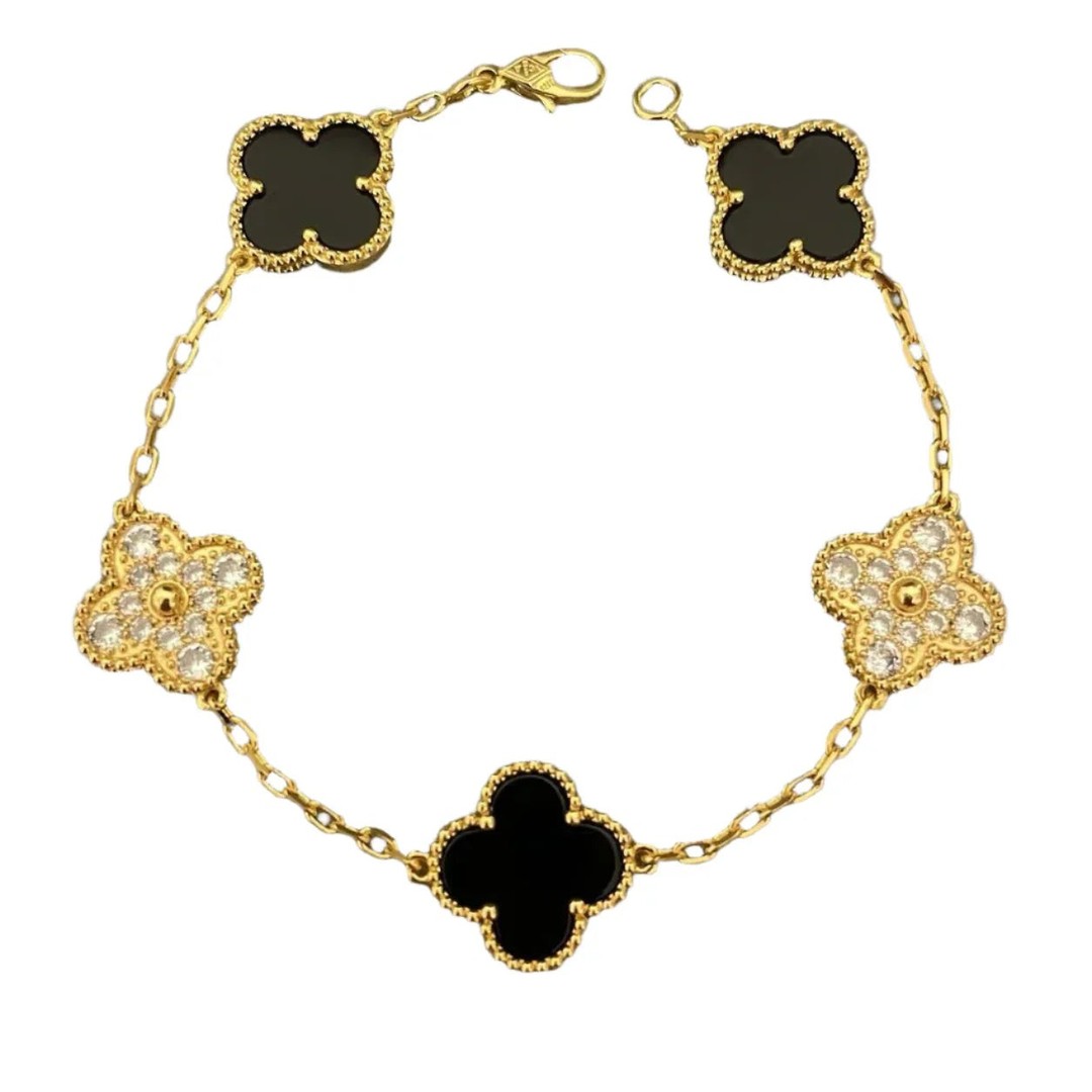 Sliding a piece of timeless elegance onto your wrist—that's the moment this bracelet becomes part of your story.

Crafted from genuine 925 sterling silver with a striking black and 18k gold finish, this clover bracelet symbolizes prosperity and sophistication. The cubic zirconia sparkle catches light beautifully, while the adjustable clasp fits wrists from 6" to 8", making it perfect for anyone.

Wear it daily or save it for special moments—either way, you're investing in a piece that lasts.

https://ssdlr.shop/l/e0523ef5

#925SterlingSliver #CloverBracelet #LuxuryJewelry #UnisexStyle #TimelessElegance