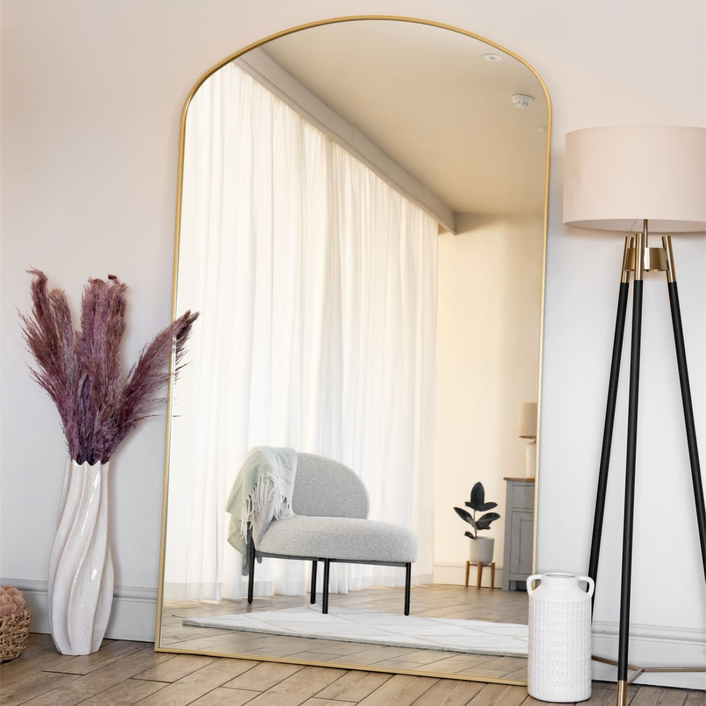 Oversized mirrors don't just reflect—they transform entire rooms into galleries of light and space.

The Yoko gold arched mirror makes walls disappear. At 180x105cm with its softly curved top and brushed gold frame, it's the statement piece that changes everything about how a room feels.

Perfect for creating depth, amplifying natural light, and adding that design-forward elegance to any interior. Available now for £309.95.

Shop the Yoko at https://jobuhome.com/products/yoko-gold-metal-gentle-arch-mirror-180cm-x-105cm

#ArchivedMirror #GoldMirror #InteriorDesign #HomeDecor #StatementPiece